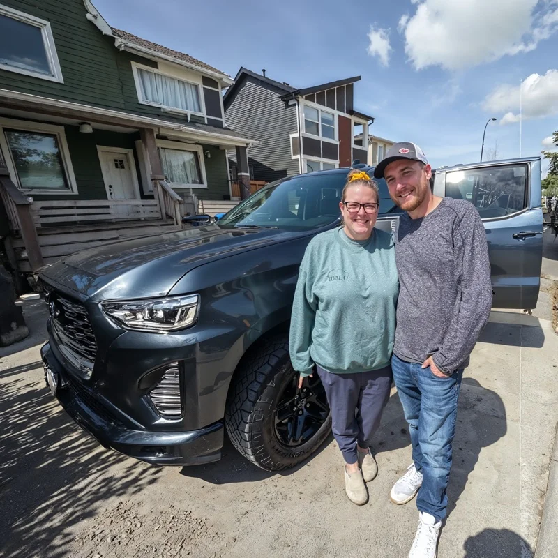 Mike & Emma with their approved New SUV