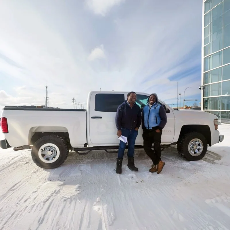 Jason & Sarah with their approved White Pickup Truck