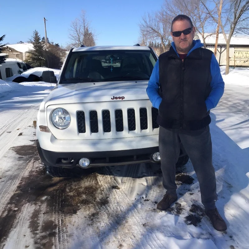 David R. with their approved White Jeep