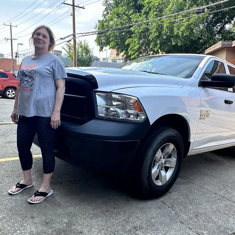 Patricia R. with their approved RAM 1500 Work Truck